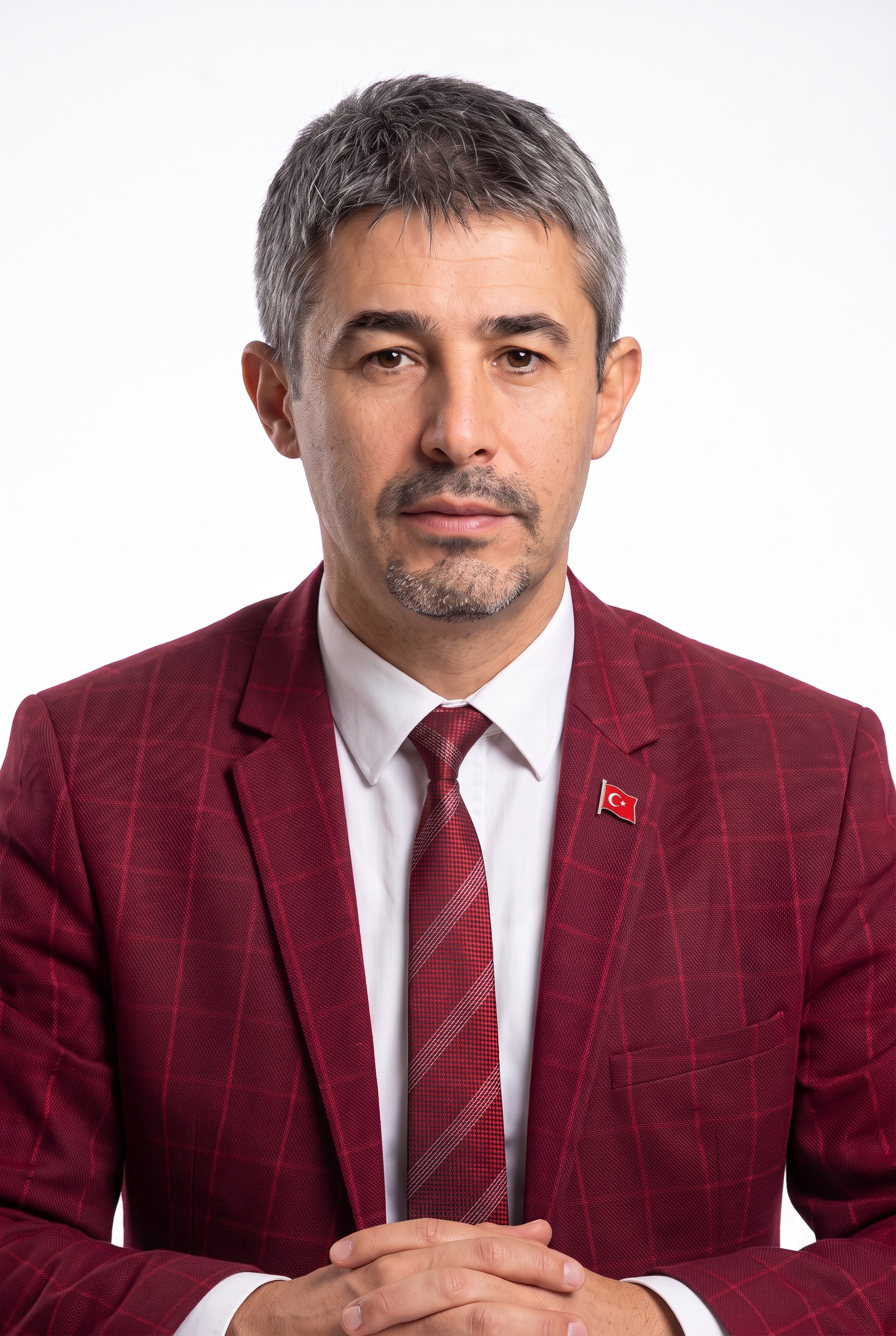 Tuncay Özen’in bir toplantıda çekilen portresi
